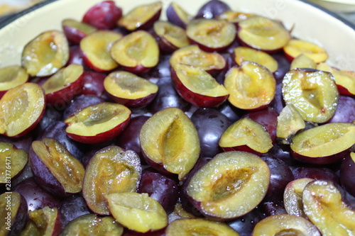halves of plums pitted with sugar