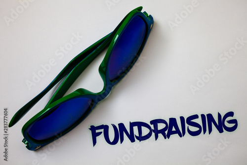 Conceptual hand writing showing Fundraising. Business photo text Seeking of financial support for charity cause or enterprise Ideas messages white background communicate thoughts inspire photo