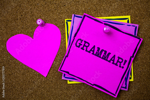 Writing note showing Grammar Motivational Call. Business photo showcasing System and Structure of a Language Writing Rules Papers pink heart cork background ideas love lovely message remember photo