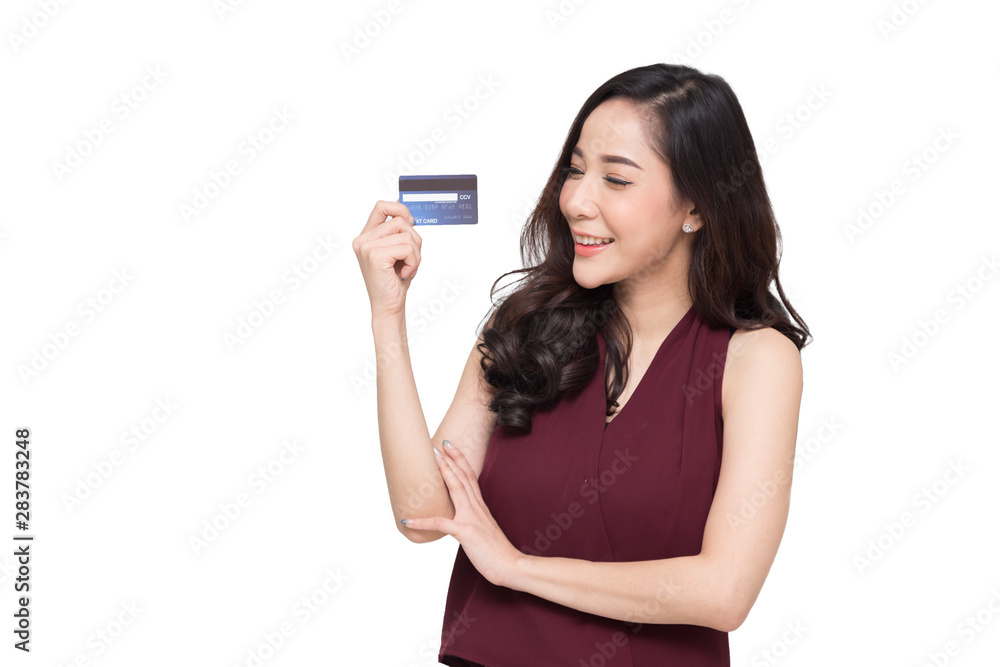 Happy Asian woman holding credit card or cash advances, Pay instead of money and specially curated benefits for lady card concept Happy Asian woman holding credit card or cash advances, Pay instead of money and specially curated benefits for lady card concept