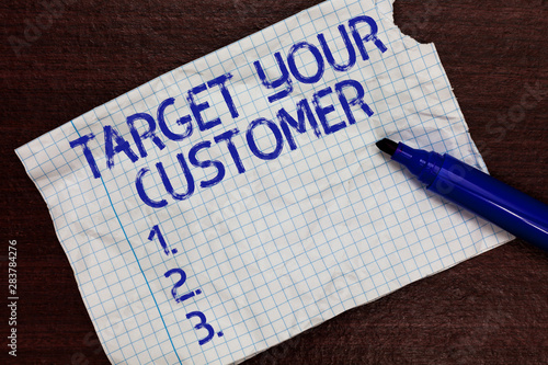 Writing note showing Target Your Customer. Business photo showcasing Tailor Marketing Pitch Defining Potential Consumers Squared notebook paper Markers Communicating ideas Expressing feelings