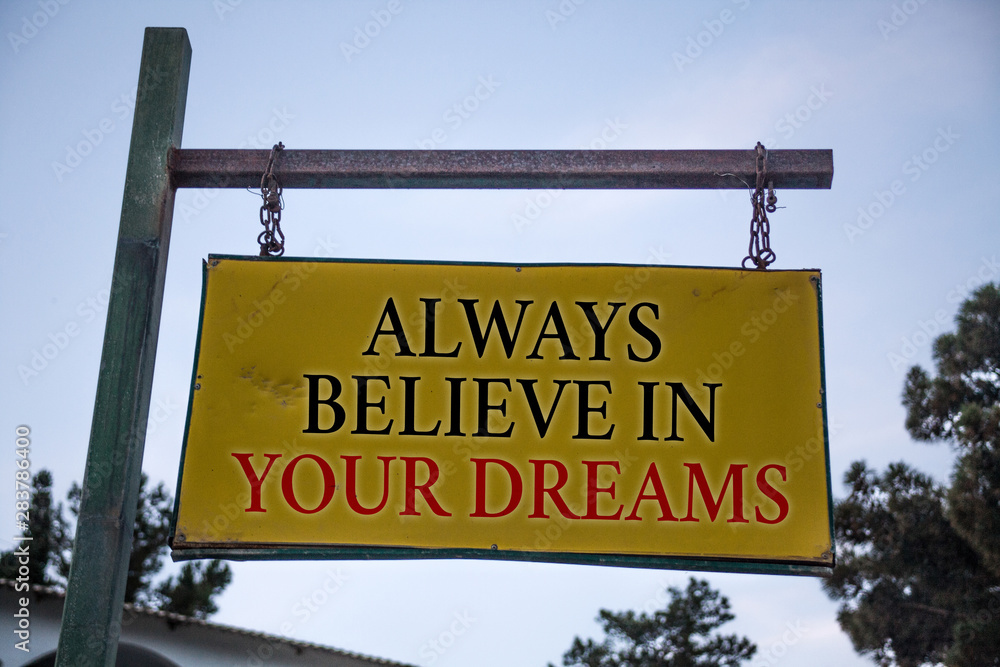 Handwriting text Always Believe In Your Dreams. Concept meaning confidence Faith Believing in yourself Messages object location yellow banner frame metal board billboard yellow