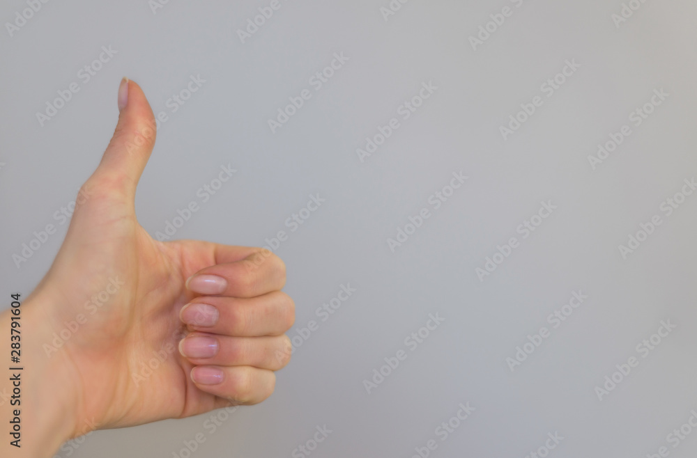 Woman thumb up, giving a good feedback, review. Woman thumb up, giving a good feedback, review.
