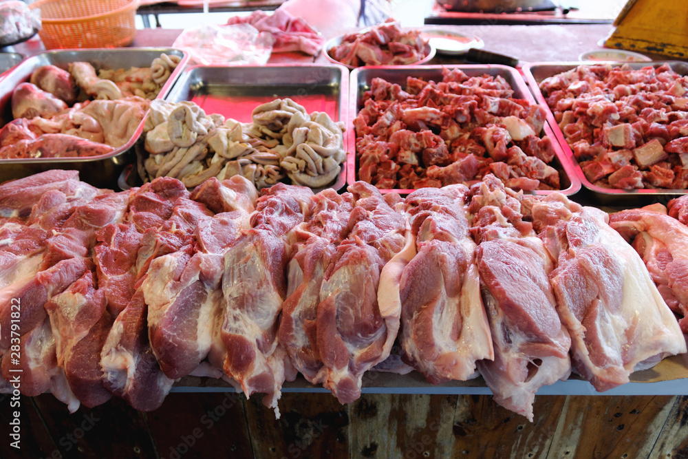 Raw pork and offal at local market