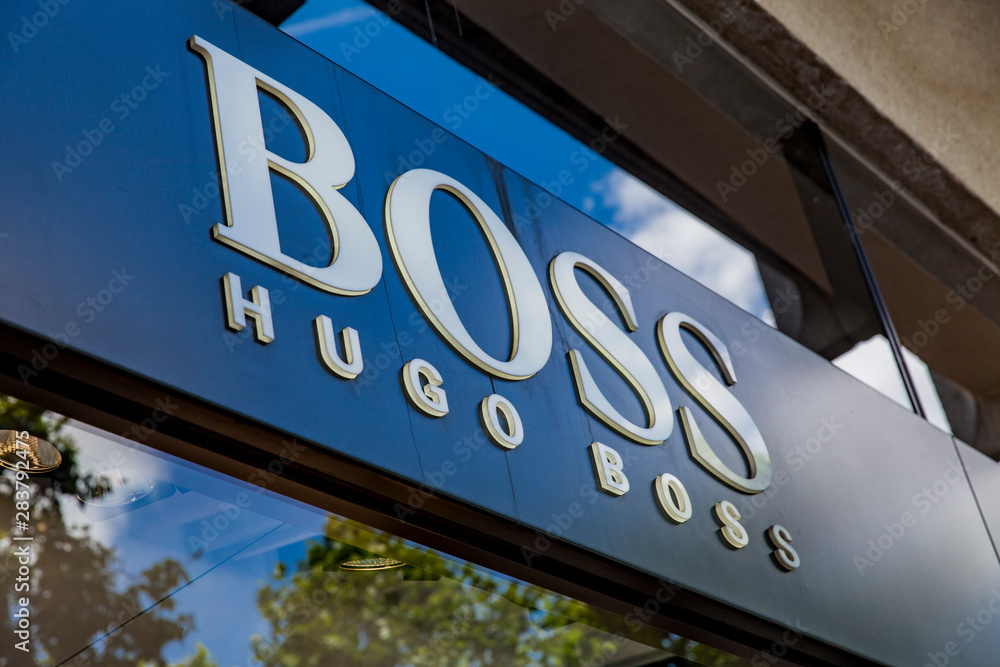 Dialoog sponsor sigaret Detail of Hugo Boss store in paris, France. It is a German luxury fashion  house founded at 1924. Stock Photo | Adobe Stock