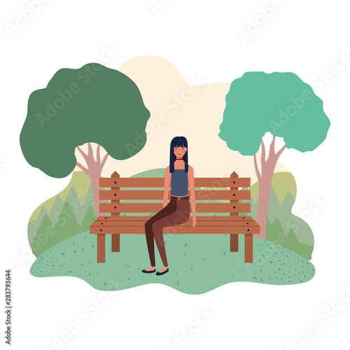 woman sitting in park chair with background landscape