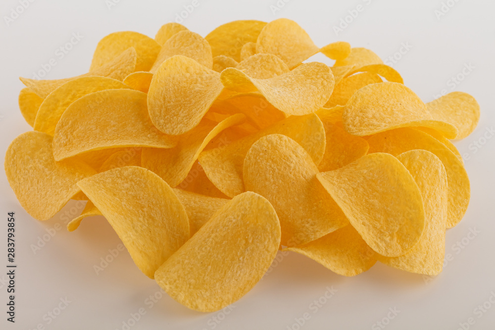 Potato chips isolated white background. Side view. Potato chips isolated white background. Side view.