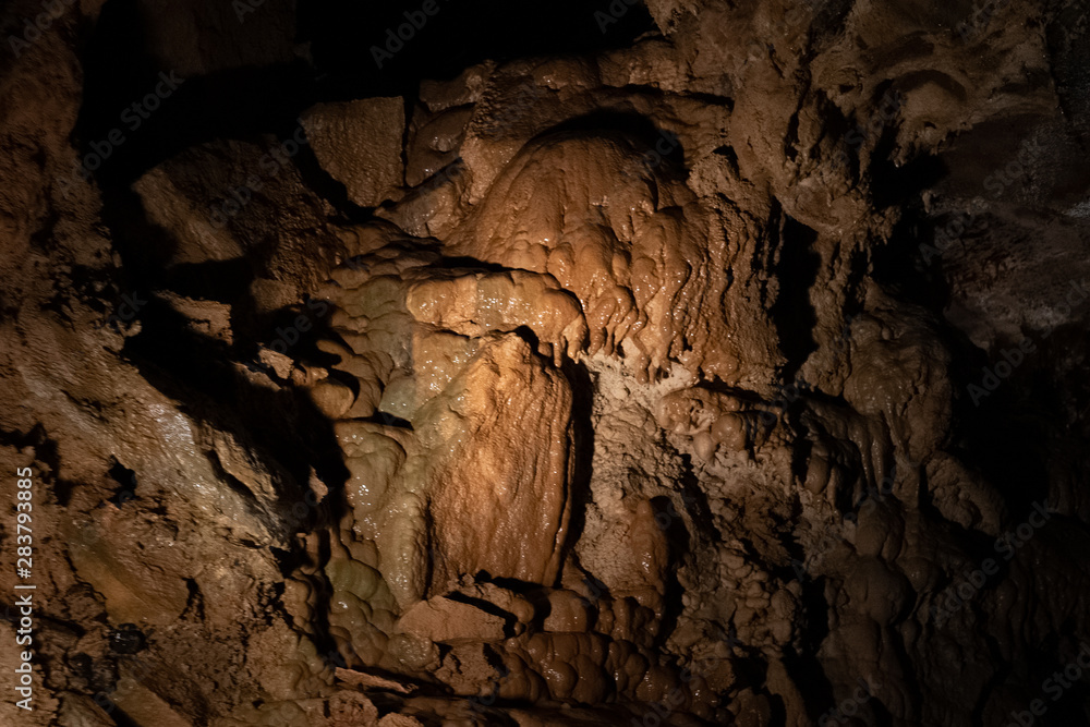 Fototapeta premium Underground caverns illuminated to show unique formations