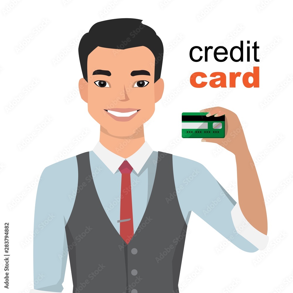 Young asian man smiling, showing, presenting credit card for making paymen.