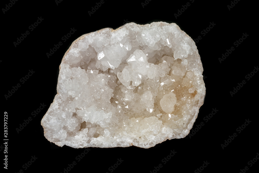 Fototapeta premium Macro mineral quartz snow stone on a black background