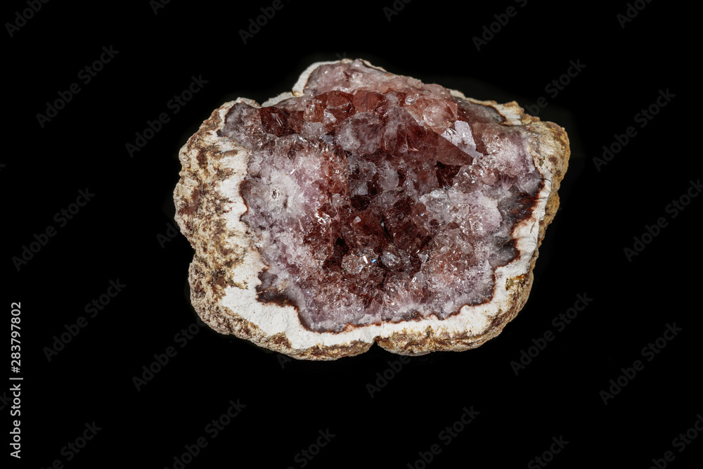 Macro mineral stone Pink Amethyst on a black background Macro mineral stone Pink Amethyst on a black background