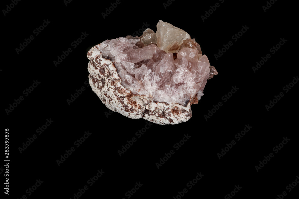 Macro mineral stone Pink Amethyst on a black background Macro mineral stone Pink Amethyst on a black background