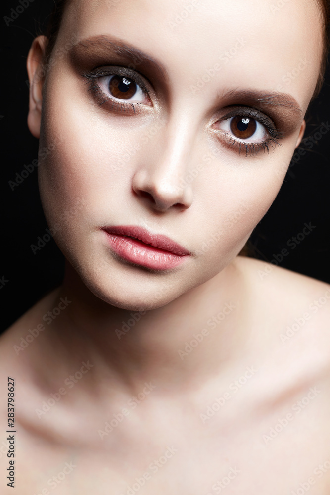 beautiful girl with big brown eyes. clean skin face beautiful girl with big brown eyes. clean skin face