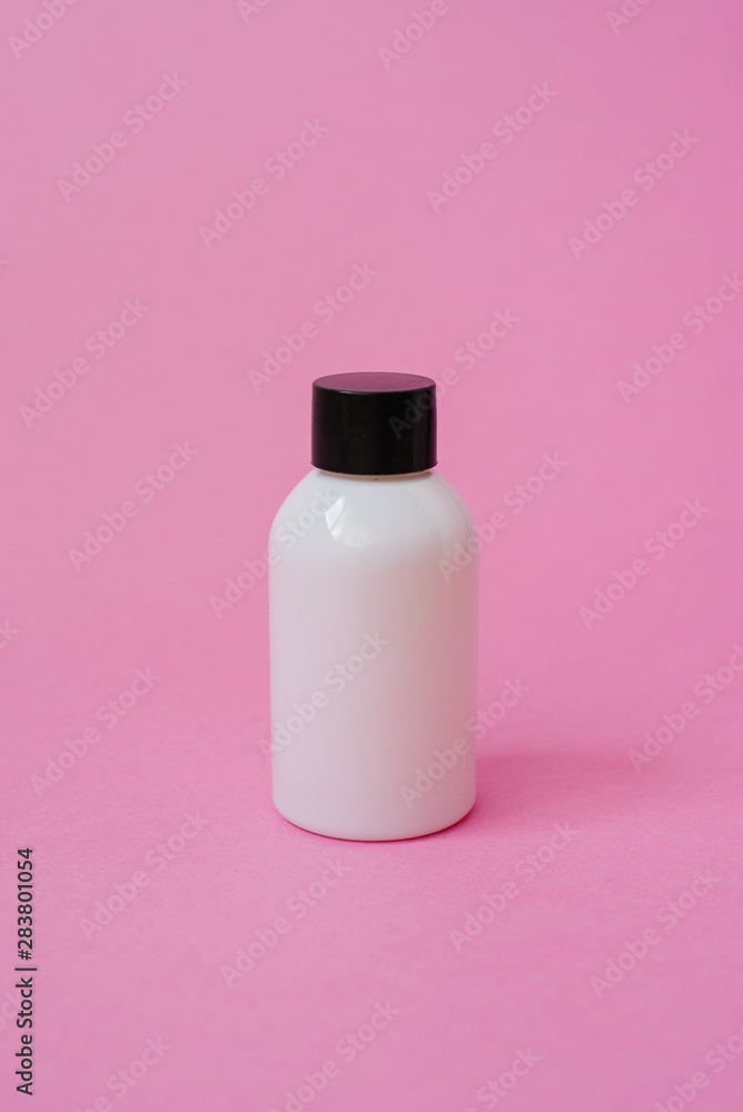 Realistic white cosmetic cream container. The layout of the bottle. Gel, balm and oil, without label for design on pink background Realistic white cosmetic cream container. The layout of the bottle. Gel, balm and oil, without label for design on pink background