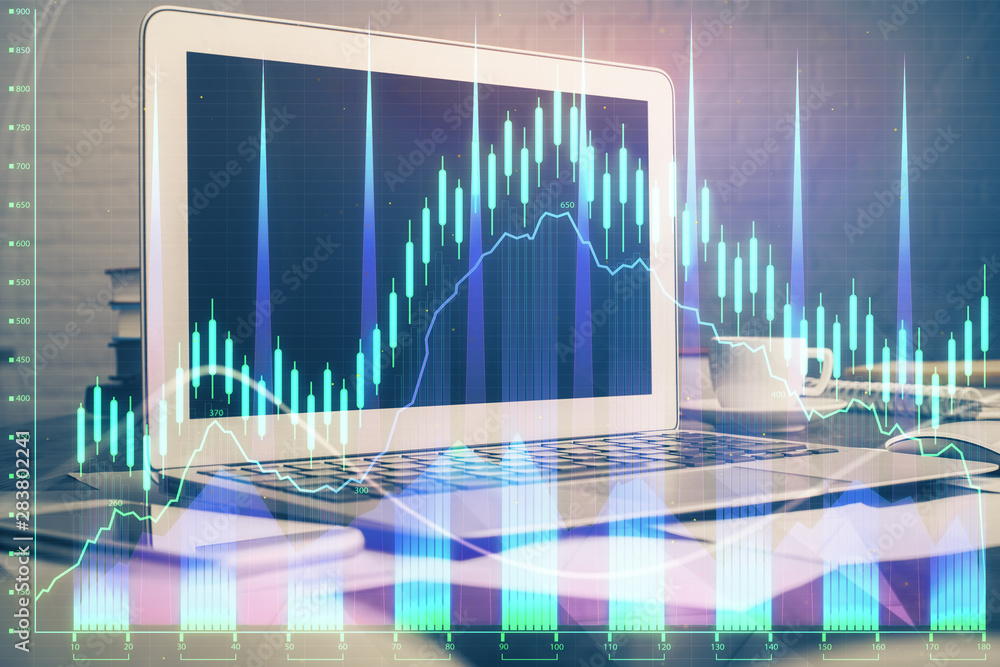 Financial market graph hologram and personal computer on background. Double exposure. Concept of forex. Financial market graph hologram and personal computer on background. Double exposure. Concept of forex.