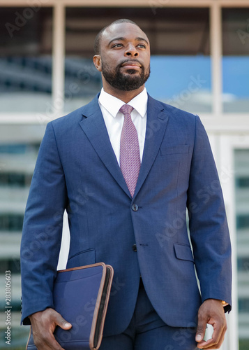 Portrait of businessman in blue suit