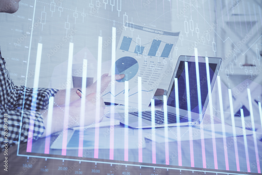 Multi exposure of financial graph with man works in office on background. Concept of analysis. Multi exposure of financial graph with man works in office on background. Concept of analysis.