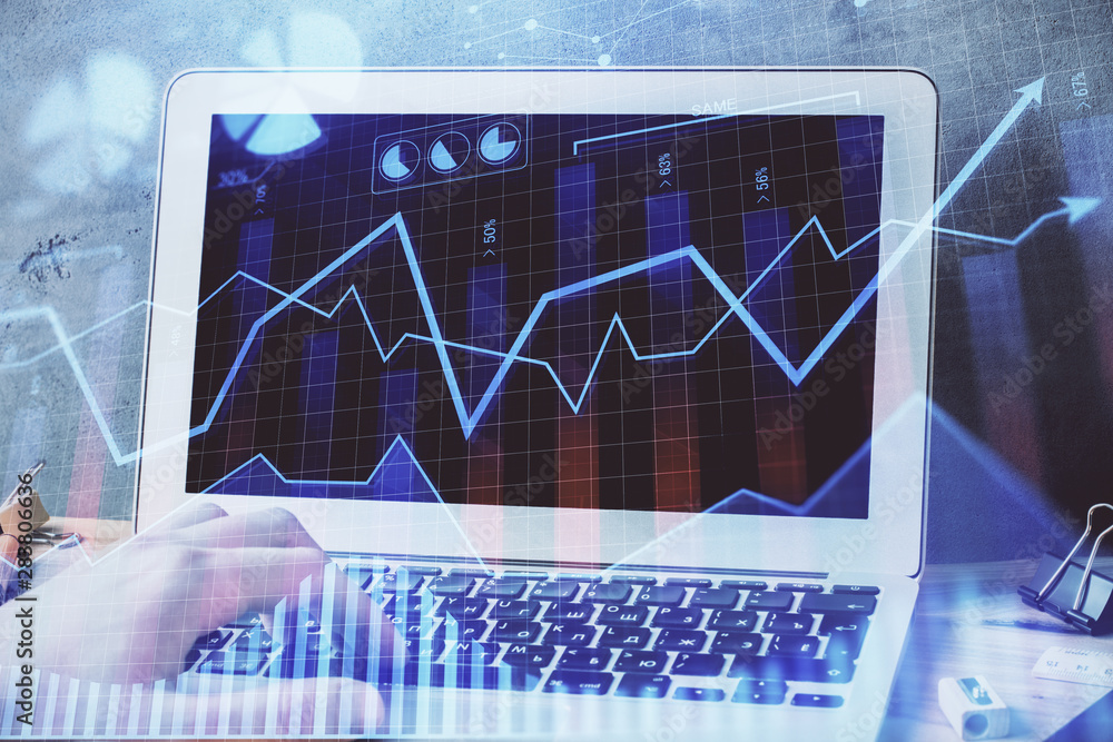 Forex graph with businessman working on laptop on background. Concept of hardworking. Multi exposure. Forex graph with businessman working on laptop on background. Concept of hardworking. Multi exposure.