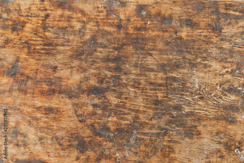 Texture of old wooden board. Dirty and scratched plywood.