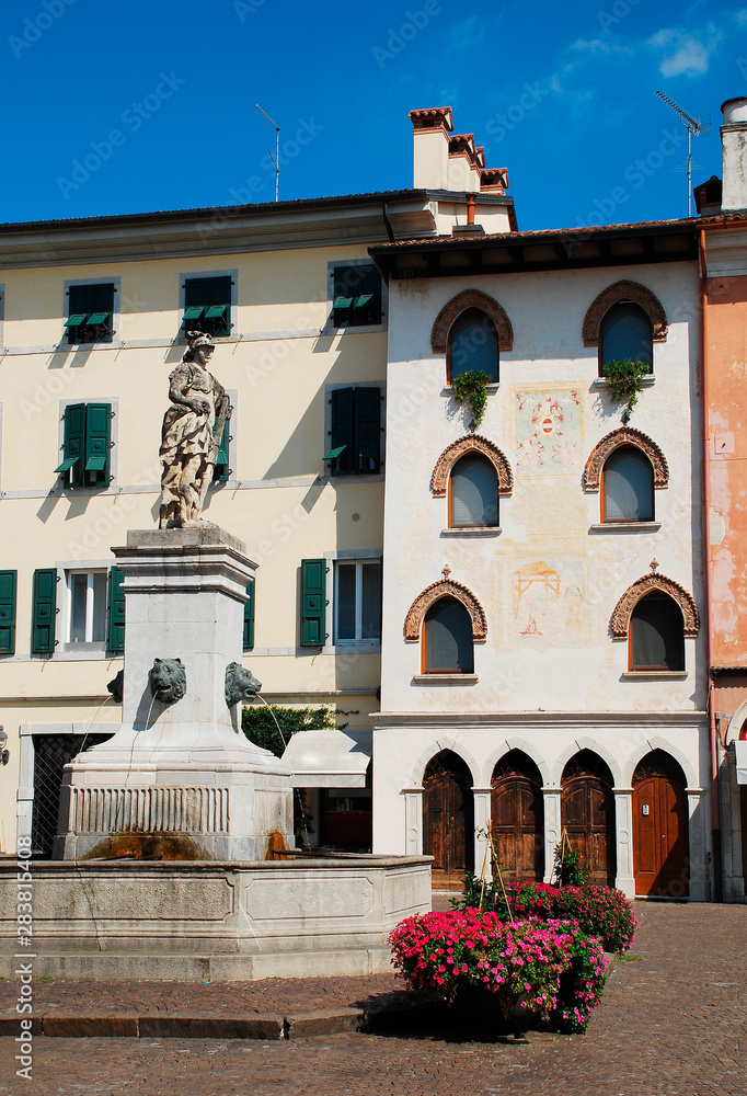 Piazza Paolo Diacono in the UNESCO World Heritage Centre town of Cividale Del Friuli, Italy.  The statue atop the fountain features four lion heads and Diana The Hunter, and was donated to the city by