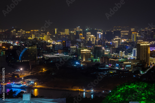 night view of the city of Sanya from the observation deck. The deer turned the head of the island of Hainan. China
