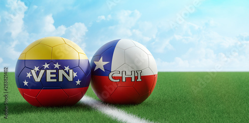 Chile vs. Venezuela Soccer Match - Soccer balls in Chile and Venezuelas national colors on a soccer field. Copy space on the right side - 3D Rendering photo