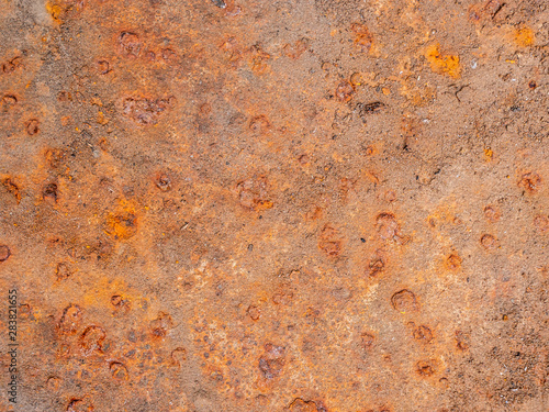 Rusty metal. Craters Corrosion. Abstraction. Rust color surface. Background.