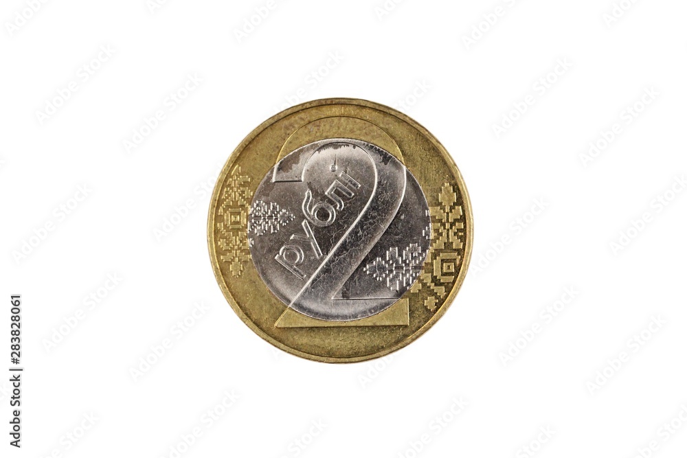 A bimettalic, two Ruble coin from Belarus isolated on a white background, shot close up in macro A bimettalic, two Ruble coin from Belarus isolated on a white background, shot close up in macro