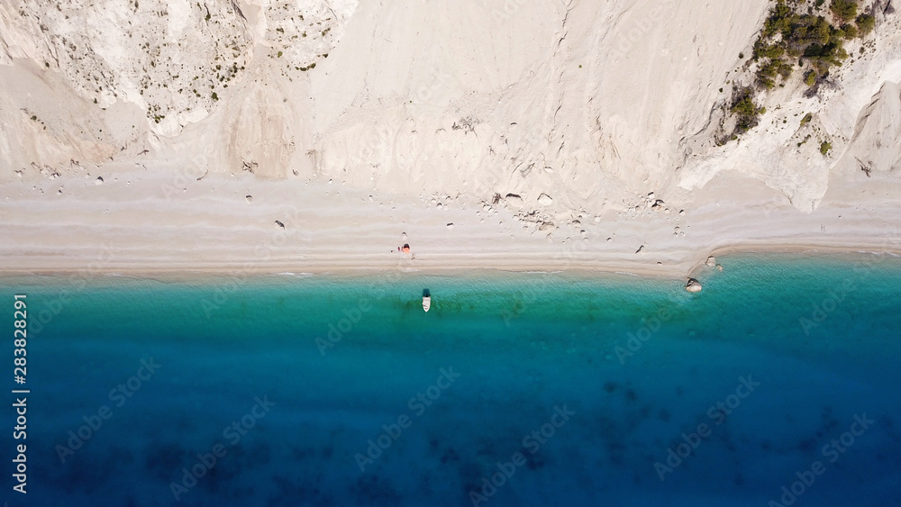 Aerial drone photo of iconic paradise beach of Egremni with white rock steep cliff and emerald clear sea, Lefkada island, Ionian, Greece