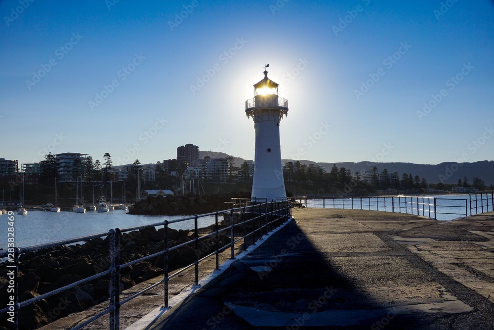 Breakwater Lighthouse with the setting sun streaming through the lantern room