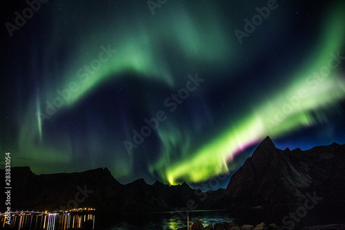 Northern lights above Reine in Lofoten islands in Norway