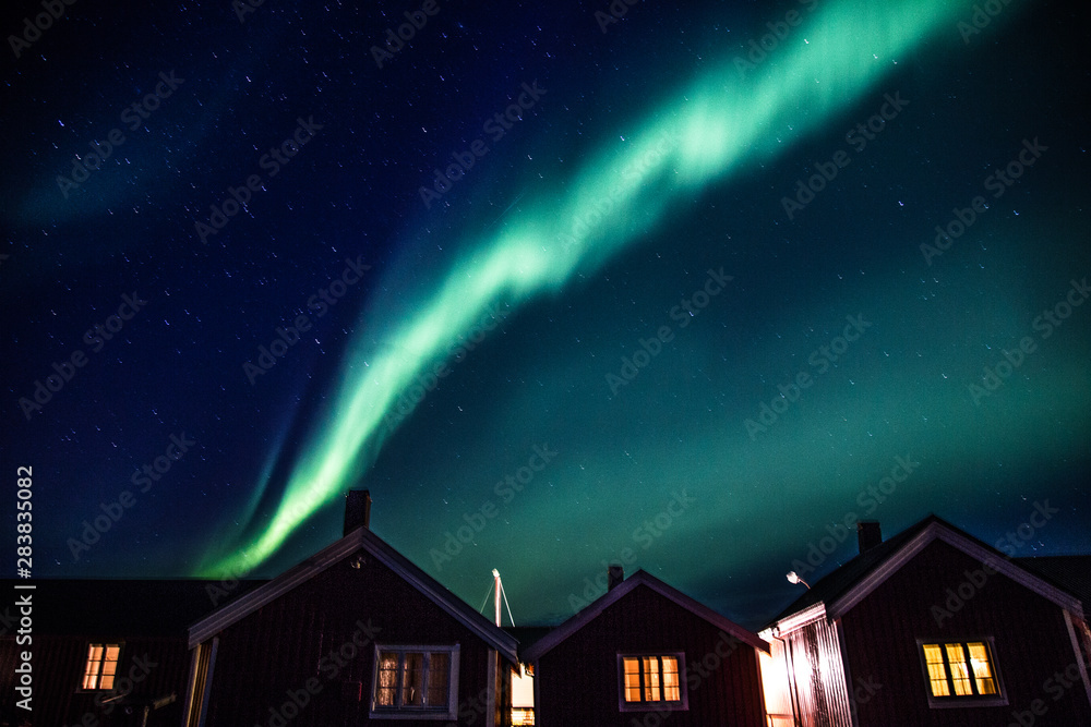 Northern lights above Reine in Lofoten islands in Norway Northern lights above Reine in Lofoten islands in Norway