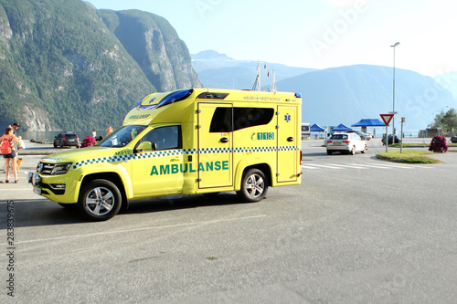 WALLDAL, NORWAY - July 2019: yellow ambulance car in Norway photo