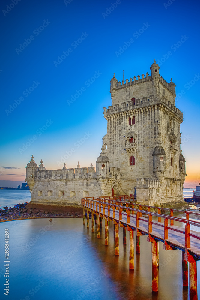 Famous Belem Tower on Tagus River in Lisbon at Blue Hour, Portugal.