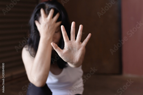 Young woman shows gesture of stop harassment and violence, depressed woman, Stop violence against women,International women's day photos