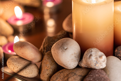 energetic stones, soft light and aromatic candles for yoga session
