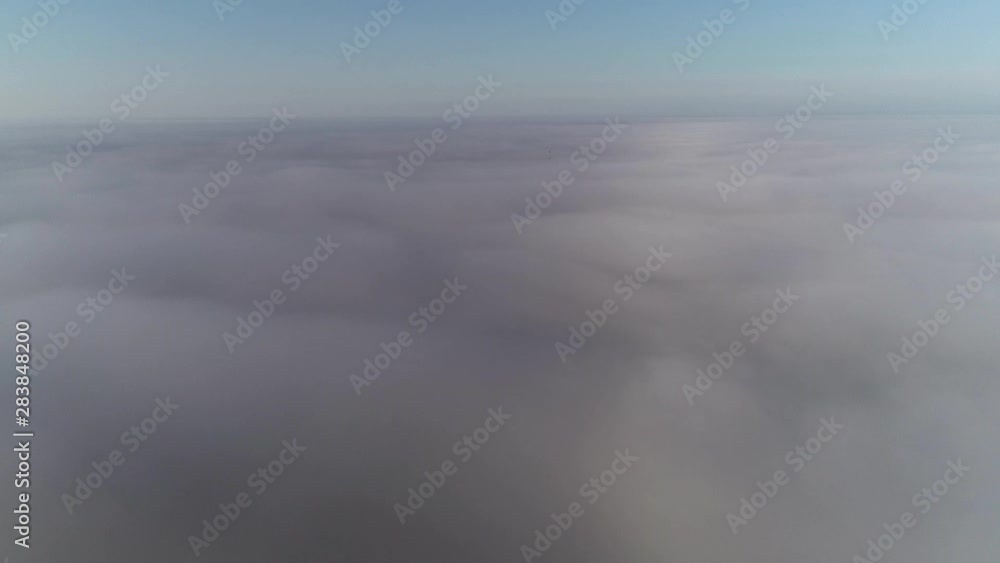 Flight above clouds in morning golden hour Flight above clouds in morning golden hour