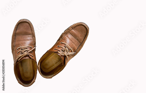 Old Brown leather shoes isolated