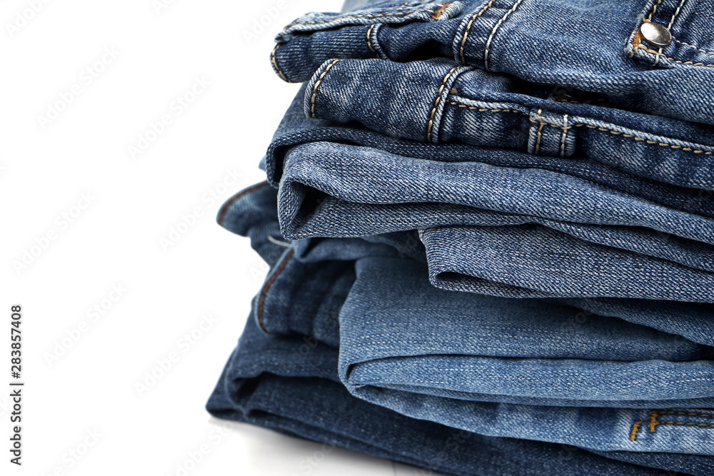 blue jeans on dark wooden background blue jeans on dark wooden background