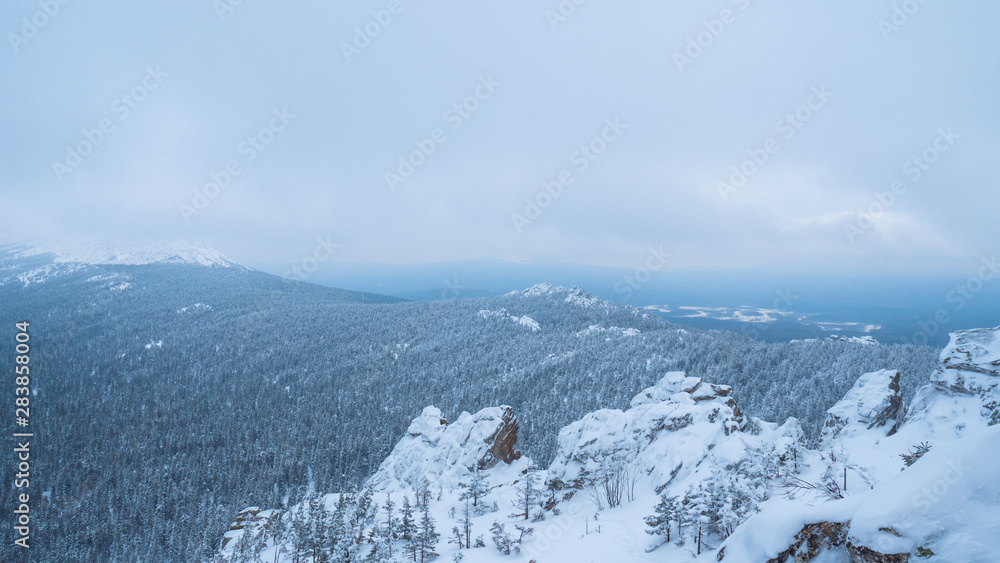 Snow-capped peaks of Taganai National Park located in the South Urals in Russia.