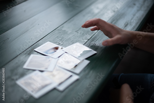Polaroids on table