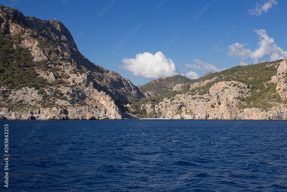 Karpathos island - The coast near Pigadia, in the distance Ahata beach, Dodecanese Islands, Greece