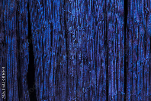 Natural Indigo dye cotton fabric, Cotton yarn dyed blue nature color, traditional fabrics of Thailand, Selective Focus 