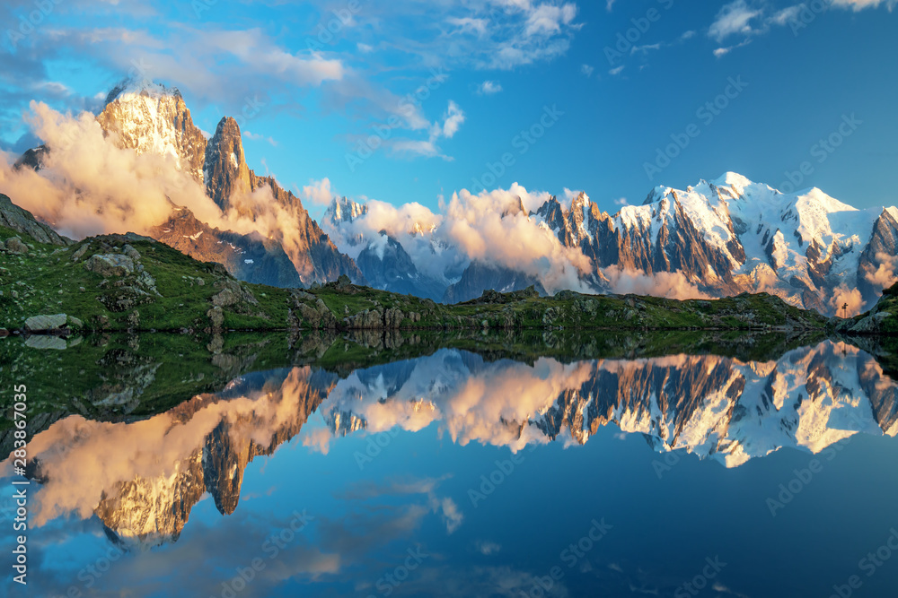 Sunset  panorama of the Lac Blanc lake with Mont Blanc (Monte Bianco) on background in Chamonix location. Beautiful outdoor scene in Vallon de Berard Nature Reserve, France