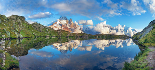 Sunset  panorama of the Lac Blanc lake with Mont Blanc (Monte Bianco) on background in Chamonix location. Beautiful outdoor scene in Vallon de Berard Nature Reserve, France