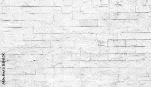 Gray or light white brick wall horizontal background , sandstone seamless patterns abstract texture 