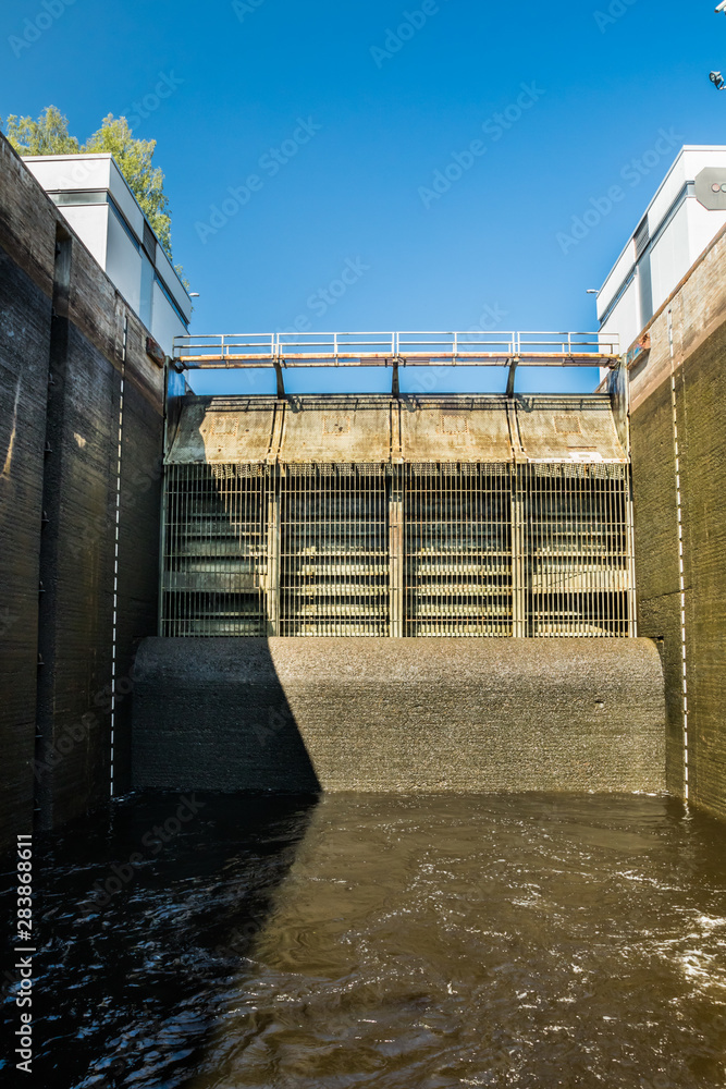 Lappeenranta, Finland - August 7, 2019: Lock on the Saimaa Canal at Malkia. View from water. Lappeenranta, Finland - August 7, 2019: Lock on the Saimaa Canal at Malkia. View from water.