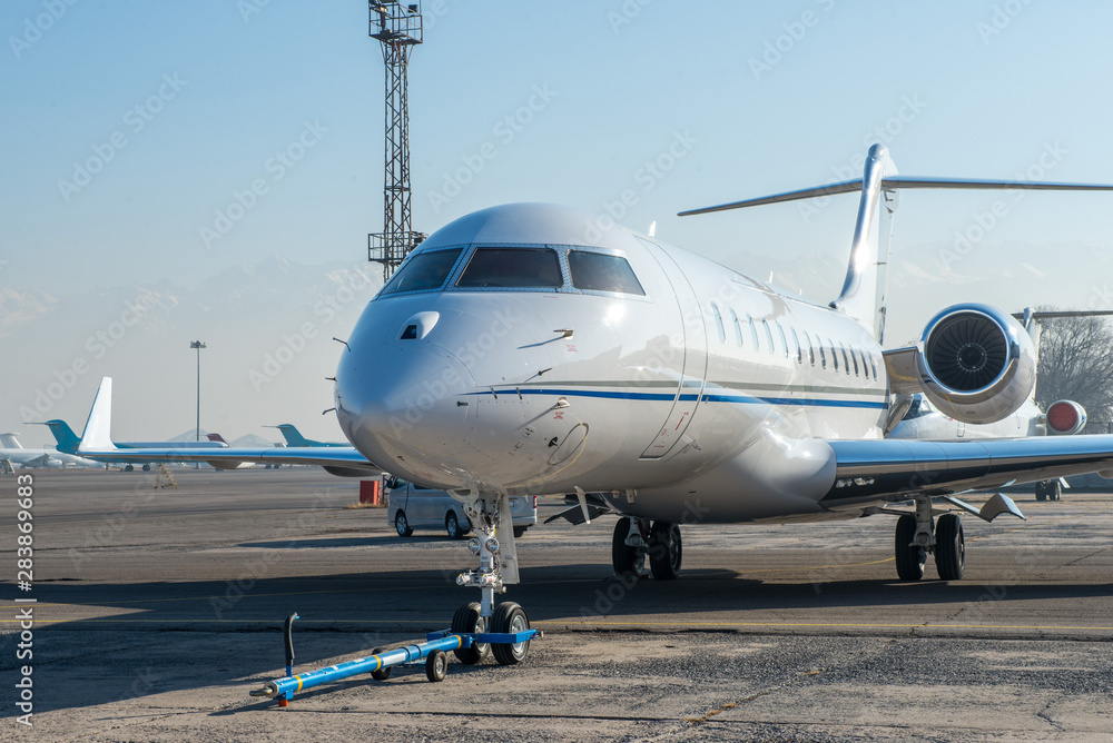 Business jet plane on the ground. Business jet plane on the ground.