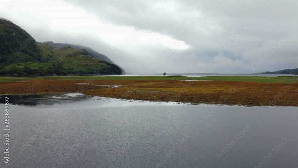 Scottish Highlands Loch Long drone shot of lake on a cloudy moody day Scottish Highlands Loch Long drone shot of lake on a cloudy moody day
