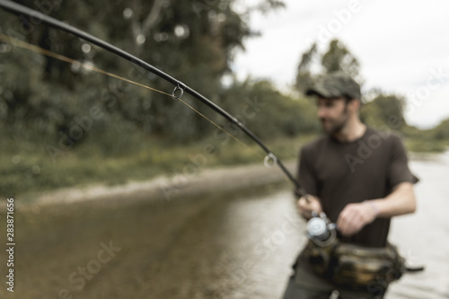 Man fishing at the river